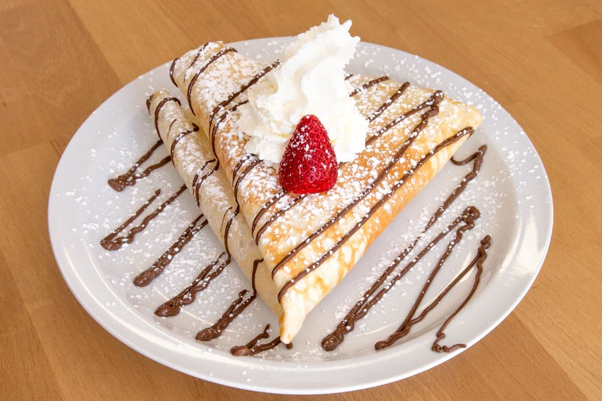 12. Nutella, Banana, Strawberry, and Whipped Cream Crepe