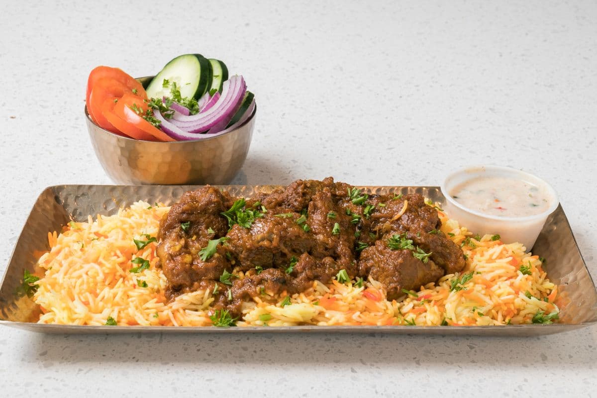 Goat Biriyani with Salad and Raita